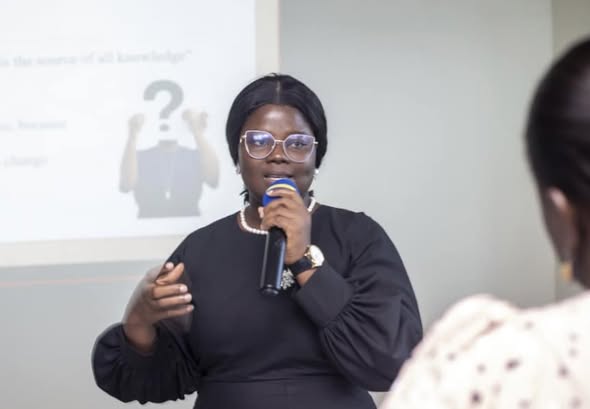 A speaker presenting at a GDA event