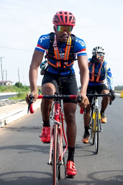 Cyclists riding during a GDA climate awareness activity